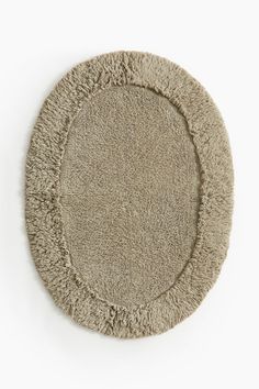 a round rug on a white background