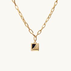 This ultra-modern square tag pendant features a stunning “pushing-the-boundaries” style sparkling with midnight blue crystals. A petite bail on the top connected to a rectangle cable chain necklace keeps this pendant centered, all in a bright shine. 
 
Length: 18.9in
Width: 7mm
Stone Color: Midnight Blue
Pendant Size: 17x17mm
Material: Starlight Quartz, 18k Gold Plated On Brass Modern Necklaces With Rectangular Pendant And Cable Chain, Luxury Jewelry With Adjustable Square Pendant, Luxury Square Pendant Jewelry With Adjustable Chain, Everyday Necklace With Square Pendant And Polished Finish, Luxury Everyday Necklace With Rectangular Pendant, Everyday Square Pendant Necklace With Polished Finish, Luxury Rectangular Pendant Necklace For Everyday, Modern Jewelry With Delicate Chain And Rectangular Pendant, Modern Jewelry With Rectangular Pendant Box Chain