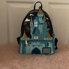 Hard To Find Blue Cinderella Castle Loungefly Backpack. Never Used, Great Bag To Take To Disney Parks. Outside Zipper Pocket With Two Outside Pockets As Well. Spacious Interior. Blue Backpack For Theme Park, Blue Standard Backpack For Theme Park, Blue Disney Backpack With Zipper Closure, Blue Disney Backpack For Travel, Blue Backpack With Zipper For Disney Trips, Blue Disney Travel Backpack, Blue Disney Bag With Zipper Closure, Blue Disney Bags With Zipper Closure, Disney Blue Bags With Zipper Closure