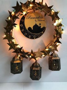 the ramadan decorations are hanging on the wall