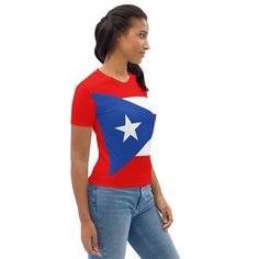 Show your love for Puerto Rico with this patriotic women's t-shirt! The Puerto Rico Flag T-shirt features an overall print of the colors of Puerto Rico, with a small "Puerto Rico" text on the back. Made of 95% polyester and 5% elastane, this t-shirt has a regular fit and is perfect for any occasion. Whether you're from Puerto Rico or just love the island, this t-shirt is a must-have for your wardrobe. Wear it to show your pride during national holidays, sporting events, or just as a casual outfi Fitted Flag Print Short Sleeve Tops, Red Flag Print T-shirt, Fitted Patriotic Short Sleeve Tops, Fitted Red Flag Print Top, Fitted Red Top With Flag Print, Puerto Rico Flag, Porto Rico, Costume Intero, National Holidays