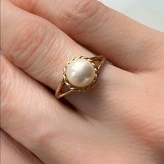 Vintage Pearl Ring 14K Yellow Gold Pearl 6.7mm 2.5gm Size 5 Sizing available with fee contact us to have it added to the price before check out. Thank you for visiting our shop! Visit our website DmKJewelry.com Also Follow us on Instagram https://www.instagram.com/dmkjewelry_/ Classic 14k Gold Stackable Pearl Ring, Handmade Yellow Gold Pearl Ring, Hypoallergenic Round Pearl Ring For Anniversary, Hypoallergenic Pearl Ring For Anniversary, Classic Handmade Rings, Classic Gold Pearl Ring With Halo, Elegant Hypoallergenic Oval Rings, Classic Pearl Ring With Halo Detail, Classic Pearl Ring With Halo For Gift