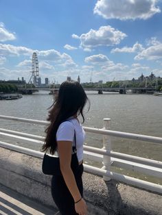 Cute outfit 
Simple outfit 
White top 
Black pants
Black purse
London
London eye
River
Aesthetic 
No face posing Cute Summer Outfit, White Short Sleeve Tops, Purse Fashion, Black Purse, London Eye, Black Purses, Cute Summer Outfits, Fashion Aesthetic