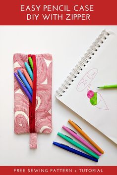 an easy pencil case with zipper and crayons on the table next to it