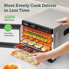 a person placing food in an oven on a counter top with the words, more evenly cook deliver in less time