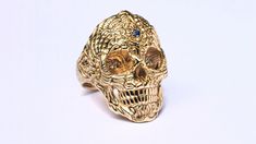 Solid Gold Sacred Skull Ring, from the series of sacred jewelry. METALS The ring is made to order in 10K, 14K, 18K or 22K yellow gold. MEASUREMENTS AND SIZES The ring can be made in any needed size. Please contact us to check for the price for extra large sizes (US13+) GEMSTONES Stone size - 2mm Basic options for the stone are: tsavorite, black diamond, sapphire, ruby.. * *almost any other stones selection are possible by request.. Please contact me, if you want to find a unique combination for Symbolic Skull Rings Collectible, Collectible Symbolic Skull Rings, Engraved Skull Ring For Anniversary, Men Gold Jewelry, Ring Men Gold, Sacred Jewelry, Mens Skull Rings, Skull Rings, Gothic Ring