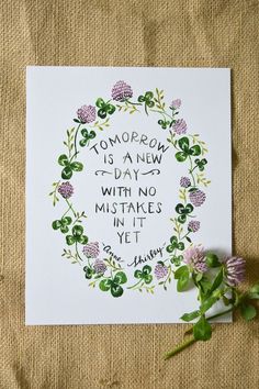 a card that says tomorrow is a new day with no mists in it and some flowers