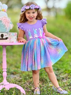 You've never seen an Easter tutu dress like this before! Bursting to the bring with color and cute style, the tiered flutter sleeves, embroidered bunnies, and ruched skirt will have your little girl smiling from ear to ear. Put this tutu dress front and center when the occasion calls for color and fun! SUPER soft and lightweight materials used in the skirt make it a dress she won't want to take off. Fully lined skirt gives her the confidence to move and play without worry. Perfect for Spring, Easter, school events, birthday parties, and year-round play Dress features scalloped flutter sleeves, a gradient rainbow polka dot bunny silhouette embroidered bodice with cotton tail applique, small ribbon bow at the waist, and a gradient rainbow polka dot mesh tulle skirt with full lining and elast Multicolor Ruffled Dress For Easter, Multicolor Ruffled Easter Dresses, Cute Spring Twirl Dress With Ruffle Hem, Spring Twirl Dress With Ruffle Hem, Playful Multicolor Easter Dresses, Spring Whimsical Flutter Sleeve Dresses, Multicolor Playtime Dress For Easter, Cute Multicolor Twirl Dress For Spring, Playful Easter Dress-up Dresses