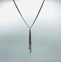 *About me: 925 silver necklace. Veronese tassel necklace with dangling cubic zirconia gem stones. tantalizing tassel neck treasure! *Size: Approx. length 46cm / 18 inches , width 0.4cm / 0.15 inches at widest, tassel length 8.5cm / 3.34 inches *Weight: Approx. 11.8 grams *Hallmark: Italy, 925 *Sponsor: DQCZ, V (Diamonique Cubic Zirconia and Veronese)  *Age: Vintage *Condition: Good vintage condition *Gift boxed to your door ** A vintage item that has been pre-loved, history of wear appropriate t Elegant Silver Chain Drop Necklace, Elegant Lariat Necklace With Silver Chain And Gold Color, Party Necklaces With Tassels And Dangle Shape, Party Dangle Necklaces With Tassels, Party Tassel Dangle Necklaces, Silver Diamond Long Drop Necklace, Elegant Silver Chain Dangle Necklace, Elegant Silver Dangle Chain Necklace, Elegant Pendant Jewelry With Dangling Beads