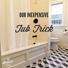 a bathroom with a black and white checkered floor, shower curtain, and tub