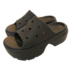 Crocs Women’s Black Stomp Slide Sandals Size: 6 New With Tags Platform Height: 2.25" Black Platform Slippers With Cushioned Footbed And Wedge Heel, Black Slides With Cushioned Footbed And Wedge Heel, Casual Black Open Toe Mules, Black Open Toe Casual Mules, Black Wedge Heel Slides For Summer, Casual Black Wedge Heel Mules, Casual Black Open Toe Platform Slippers, Black Closed Toe Platform Slides, Black Wedge Heel Slides With Removable Insole