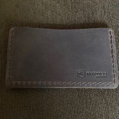 Single Track Leather Wallet In Dark Brown Color, Rustico Products Are Getting Very Difficult To Find As The Company Has Recently Closed Operations, This Wallet Has A Simple Low Profile Design With Two Stacked Slots That Hold 2-3 Cards Each (And Bills),,Less Than A 1/4”Thick At Bottom And 1/8” Thick At Top, 4.25”X2.5”,,,Holds Up To 6 Credit Cards And/Or Business Cards (Very Useful As Business Card Holder) Made From Top-Grain Cowhide Leather,,Machine Stitching ,, Feel Free To Visit Rustico Website Brown Leather Card Holder With Cell Phone Pocket, Leather Wallet With Cell Phone Pocket For Everyday, Leather Bifold Wallets With Cell Phone Pocket, Classic Leather Trifold Wallet With Cell Phone Pocket, Everyday Leather Trifold Wallet With Cell Phone Pocket, Leather Bifold Wallet With Cell Phone Pocket, Leather Card Holder With Cell Phone Pocket, Leather Wallets With Cell Phone Pocket, Leather Wallet With Rfid Blocking