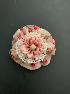 This brooch gives the extra wow factor to any outfit. It is a unique brooch that will add a touch of elegance to any dress or outfit. It can also be used with casual outfits for that unique look. Colors are lt. pink, white and beige. Silver metal back. Unique Pink Brooches For Party, Elegant Handmade Pink Brooches, Pink Flower Decoration Brooches For Party, Pink Party Brooch With Flower Decoration, Pink Party Brooches With Flower Decoration, Elegant Pink Flower Pins, Shabby Chic Flowers, Fabric Brooch, Unique Brooch