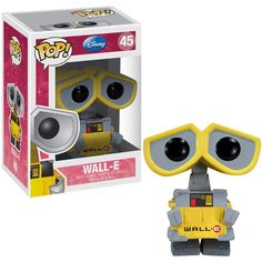 a yellow and gray robot with big eyes pop vinyl figure next to a white box