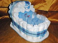 a baby's diaper cake made to look like it is in the shape of an elephant