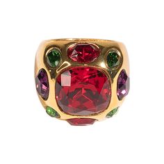 Product Description: This gold headlight ring will make only the best statement. A bold ruby center stone is surrounded by contrasting multi-colored dark gem stones.     Dimensions: 3/4" long, 3/4" wide, adjustable (approximately sizes 5-8) Gem Stones, Kenneth Jay Lane, Ethnic Fashion, Wire Jewelry, Class Ring, Stone Color, Jay, Gold Rings, Ruby