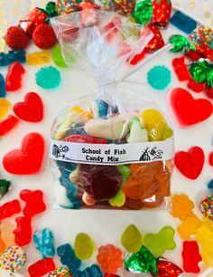 a bag filled with gummy bears sitting on top of a table