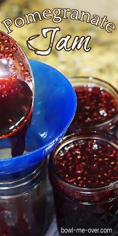 jam being poured into a blue bowl with red berries in it and the words pomegranate jam below