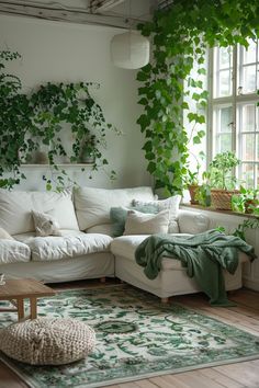 a living room filled with lots of green plants