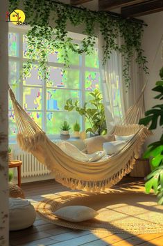 a hammock hanging in front of a window with potted plants