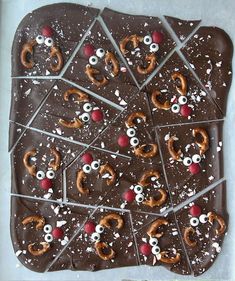 chocolate bark with pretzels and eyes on it