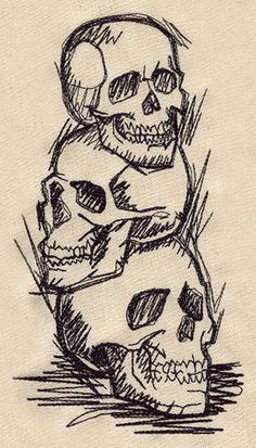 two skulls sitting next to each other on top of a piece of paper with ink