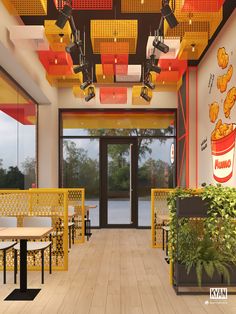 the inside of a fast food restaurant with yellow and red lighting above tables, chairs and potted plants