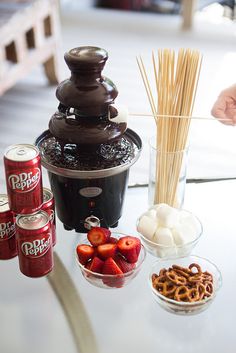 a table topped with food and drinks on top of it