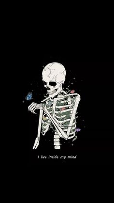 a skeleton with a butterfly on it's shoulder and the words i live inside my mind