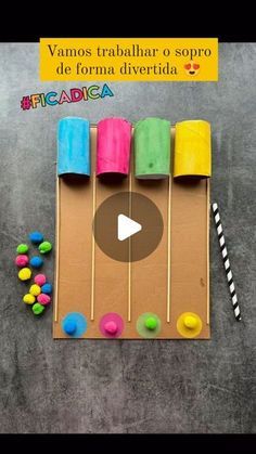 the video shows how to make popsicles out of paper and marshmallows