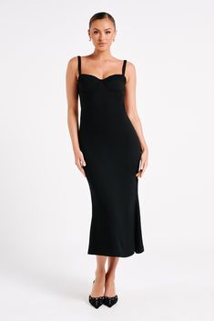 A fashion constant.CONSTANCE is a sleeveless midi dress with a semi-sweetheart neckline, slight bodycon fit, and raw hem. Lined and structured bust cups provide shape and structure, giving you confidence in the coverage and support. The shoulder straps are thin, delicate things that work well with the dress’s classic silhouette. The back enclosure features self-tie fabric straps for a moderately customised fit. A clear cut-out between the back enclosure and waistband creates the illusion of a tw Midi Corset Dress, Midi Dress Layering, Minimal Dresses, Dress With Low Back, Strap High Heels, Dress Minimal, High Neck Maxi Dress, Sporty Dress, Lace Dress Vintage