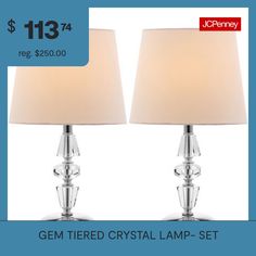 Inspired by Art Deco geometric forms, the glistening base of our tiered crystal lamp sets the stage for glamour in any room. Crafted of faceted clear crystal, this timeless design will refract light beautifully and bathe a room with a soft, warm glow. It is paired with a shade in a transitional empire shape.Set of 2Chrome baseEmpire shape shadeRotary switch61" cord100% crystalPolyester shade9x9x15"HRequires 1 CFL 13W bulb, includedMinor assembly requiredFeatures: TransparentBase Material: 100% … Art Deco Geometric, Geometric Forms, Geometric Form, Crystal Lamp, Lamp Sets, The Stage, Clear Crystal, Timeless Design, Lamps