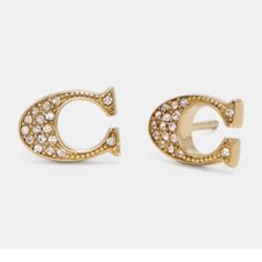 Genuine Coach Signature Stud Earrings Gold - New On Card, Offers Welcome! Product Details Plated Brass 1/2" (L) X 1/4" (H) Style No. F29824 Luxury Coach Jewelry With Polished Finish, Chic Gold Coach Bracelet, Coach Elegant Heart-shaped Jewelry, Coach Gold Heart-shaped Jewelry, Coach Clutch With Gold-tone Hardware, Coach Jewelry, Stud Earrings Gold, H Style, Gold Earrings Studs