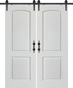 two white double doors with black hardware on each side