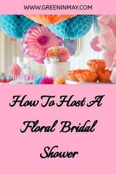 how to host a floral bridal shower with pink and blue paper flowers on the table