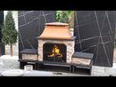 an outdoor fireplace in the middle of some concrete blocks