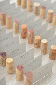 several wine corks are lined up on the table