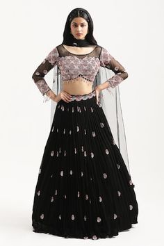 Black lehenga with bead and resham embroidered circle motifs on a pleated base. Comes with a padded sheer yoke blouse highlighted by embroidered floral circle motif pattern and bead tassels. Comes with sheer dupatta. - Aza Fashions Black Choli With Intricate Embroidery In Georgette, Black Choli With Intricate Embroidery For Eid, Semi-stitched Embellished Black Choli, Elegant Black Lehenga With Dori Work, Fitted Black Choli With Sheer Dupatta, Semi-stitched Black Lehenga With Dori Work, Fitted Embellished Black Lehenga, Black Dori Work Choli For Reception, Black Dori Work Lehenga For Reception