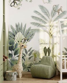 a baby's room with a giraffe and palm trees on the wall