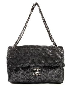 circa 2009 black sequin design leather and chain-link shoulder strap foldover top signature interlocking CC turn-lock fastening main compartment internal slip pocket slip pocket to the rear silver-tone hardware Serial Number: 12857371 Condition: EXCELLENT. This previously owned item is in near-perfect condition with no signs of damage or use. Purchasing this item continues its narrative and reduces the environmental impact by avoiding the use of new resources needed to make the product from scra