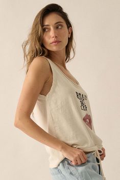 Mineral washed graphic tank top. Vintage-style "Read My Lips" text print with lips graphic. Scoop neckline with raw edge. Sleeveless with raw-edge arm holes. Scoop back. Relaxed fit. 100% Cotton. Imported top designed and printed in LA. Model wears size S. Read My Lips, Lips Graphic, Text Print, Top Vintage, White Tank Top, Raw Edge, Graphic Tank, Scoop Neckline, Graphic Tank Top