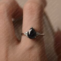 Black spinel ring pear cut black gemstone ring sterling | Etsy Elegant Black Spinel Sapphire Ring For Wedding, Elegant Sapphire Ring With Black Spinel For Wedding, Elegant Teardrop Sapphire Ring, Elegant Teardrop Sapphire Ring Gift, Elegant Black Sapphire Ring, Black Teardrop Wedding Rings, Elegant Pear-shaped Sapphire Promise Ring, Elegant Pear-shaped Sapphire Ring In Sterling Silver, Elegant Teardrop Ring For Proposal