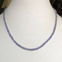 Hand Faceted Tanzanite Rondelle Beads 3-4mm (64.27 Cts) In Sterling Silver Closure Elegant Sapphire Faceted Beaded Necklaces, Elegant Sapphire Crystal Necklaces With Round Beads, Elegant Sapphire Round Beads Crystal Necklace, Sapphire Beaded Rondelle Jewelry, Elegant Sapphire Crystal Necklace With Gemstone Beads, Elegant Sapphire Necklace With Faceted Beads, Tanzanite Faceted Beads Jewelry For Gift, Blue Tanzanite Gemstone Beads Necklace, Elegant Tanzanite Gemstone Bead Necklaces