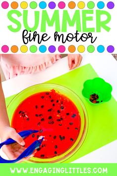 a child is making a red liquid in a bowl with blue scissors on the table