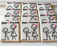 decorated cookies with stick figures and words on them