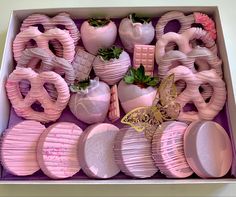 a pink box filled with lots of different items