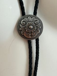 Black western bolo tie Light weight, adjustable at the front. Measures: 38 inches long end to end. Leather is in good condition For more gifts for dad: Www.Etsy.com/shop/Ashley3535 Bolo Vintage, Western Bolo Tie, Vintage Tie, Groomsmen Gift, Bolo Tie, Green Tie, Groom Gift, Gifts For Brother, Tie Accessories