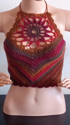 The Sunburst Mandala Crop Top is the perfect boho top for hot summer🌞 and can even be great for these cooler fall days coming up! You can wear this out on the beach, festivals, hanging out or an evening out with a light cool cover up! It features an intricate sunburst design at the neckline, cropped fit, lacy side edgings, and picot stitch trim! It ties at the neck and laces up the back corset style to adjust for a perfect fit! This yarn is so soft and comfy. It is not itchy or scratchy. This c Crochet Sunburst, Mandala Top, Picot Stitch, Boho Hippie Style, Top Corset, Corset Back, Fall Days, Festival Tops, Boho Top