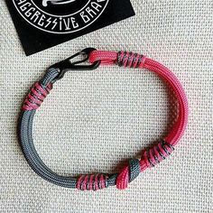 Lady viking. Scandinavian jewelry. Paracord bracelet. Gift for girls. Pink and Gray bangle.Stylish handmade paracord bracelets for those who are always moving forward. These fashion accessories are made of extremely durable, scratch-resistant rope and steel carabiner. These bracelets are ideal for both men and women. Each bracelet is precisely made by hand. The process of making one bracelet can take up to 50 minutes - it requires the closest attention to ensure the highest possible quality.Brac Military Bracelet, Scandinavian Jewelry, Viking Bracelet, Army Fashion, Viking Style, Paracord Bracelet, Pink And Gray, Paracord Bracelets, Gift For Girls