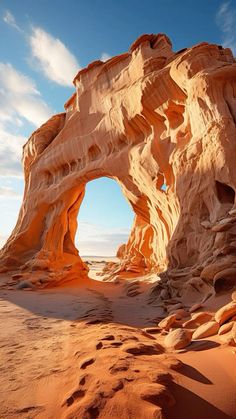 a large rock formation in the middle of a desert